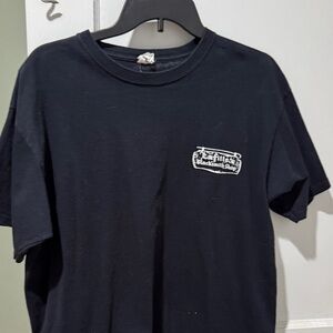 Men’s black ss tshirt. New Orleans Lafittes , the oldest bar in the US.